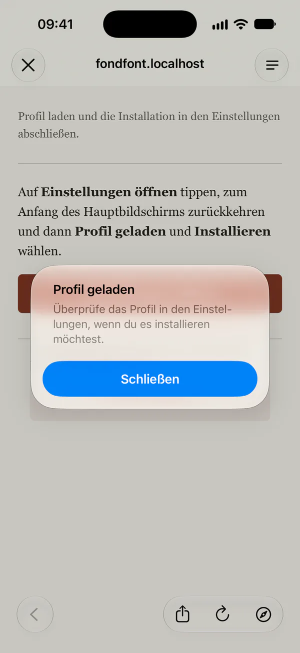Das System bestätigt den Download. Einstellungen öffnen steht auf der Seite hinter der Meldung.